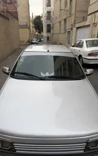 پژو 405 نقره‌ای مدل 87