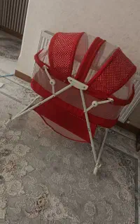 گهواره تخت کنار مادر