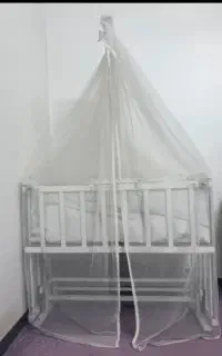 تخت‌ کنار مادر گهواره ای