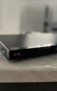 دی وی دی پلیر ال جی به همراه کابل HDMI و کنترل