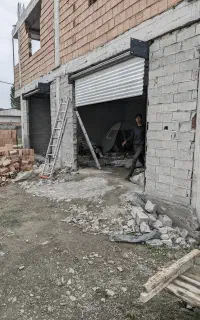 نصب، فروش و تعمیر جک کرکره درب اوپراتور راهبند