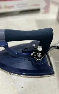 اطو بخار صنعتی (سرمی ) متصل به دستگاه بخار