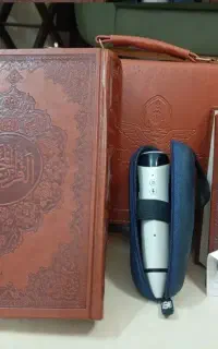 قرآن کریم همراه مفاتیح و قلم مخصوص خود کتاب