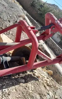 حفرچاله با چاله کن پشت تراکتوری
