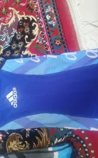 لباس و کفش کشتی بچگانه