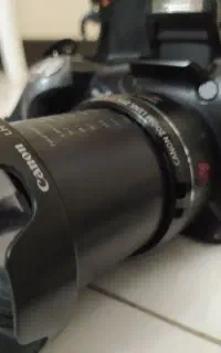 دوربین عکاسیcanon+فیلمبرداریfullHD+لنز تله زوم+رم