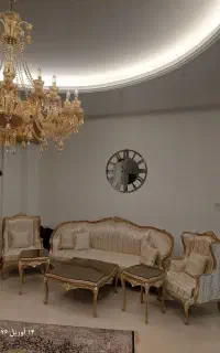 ساعت دیواری وشمعدانی