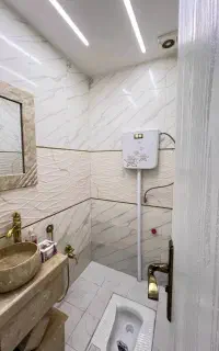 بنایی ساختمان رفع نم حمام و توالت و کاشی سرامیک