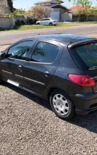 ۲۰۶ مشکی مدل ۸۳