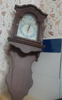 ساعت دیواری طرح چوب سوخته خوشرنگ