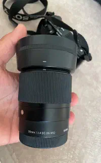 لنز در حد نو ۳۰ سیگما f1.4 dc dn
