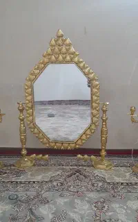 اینه و شمعدان ساده
