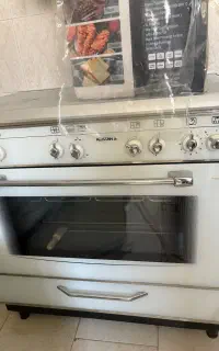 اجاق گاز عالیستان کم کار