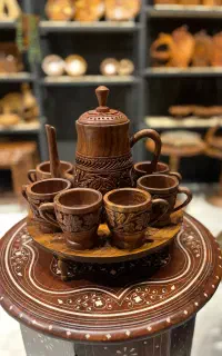 ست قوری و شش عدد فنجان و سینی قلم زنی