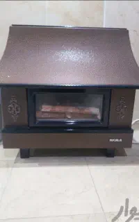 بخاری گازی شومینه نیک کالا در حد نو