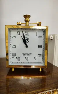 ساعت رومیزی و ظروف هفتسین