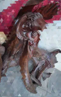 مجسمه  مولانا و شخص عصا به دست چوبی