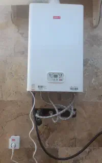 فروش نصب و تعمیرات انواع پکیج  رادیات و تصفیه اب