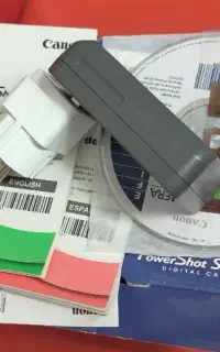 شارژر اصلی و کارتن دوربین canon
