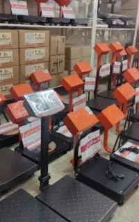 ترازو و چتر فروشی قادری