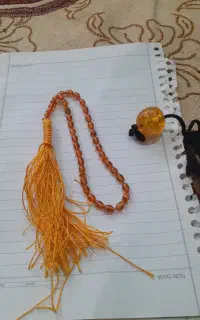 تسبیح کهربا بودار بشرط تست