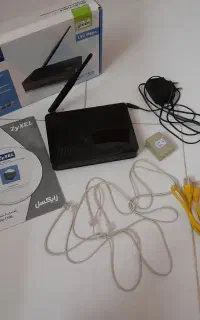 مودم روتر ZyXEL مدل DEL1202-T10B/B، کامل با جعبه