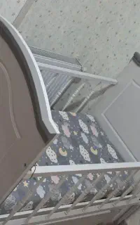تخت گهواره و تشک گارد دار نوزاد