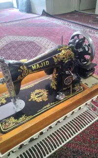چرخ خیاطی و اطوی خشک