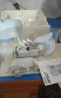 شیردوش برقی