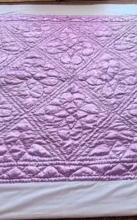 لحاف پشمی و  روی تختی دونفره