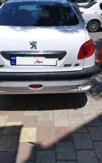 پژو 206 V8 sd  TU5عروسک