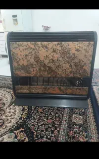 بخاری فروشی سالم فقط شیشه جلو اش شکسته