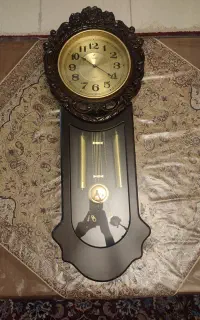 ساعت دیواری برند پرادو با چوب گردو اصل اصل نو