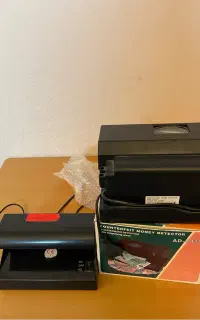 دستگاه تشیخص اصالت پول یا اسکناس