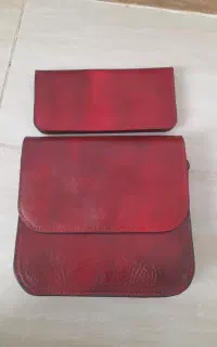 اتوبرس مو،کیف چرم،پوتین بلند چرم لباس کردی