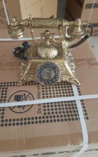 تلفن برنز نونو،حتی به پریز زده نشده و استفاده نشده