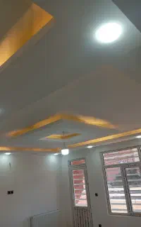 بتونه درزگیر کناف و رنگ آمیزی ساختمان