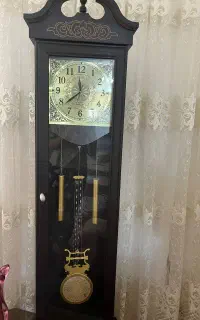 ساعت ایستاده و تابلو فرش