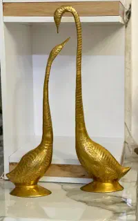 مجسمه برنزی قو و نوازنده