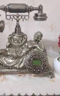 فروش فوری ساعت مچی۲عدد وگوشی تلفن کلاسیک سلتنطی