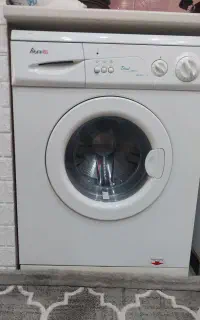 لباس شویی آبسال