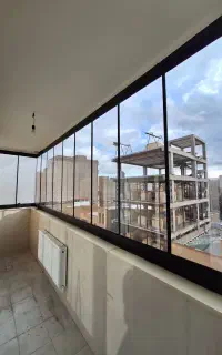 بالکن شیشه ای-شیشه سکوریت-درب اتوماتیک-نرده شیشه