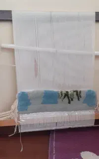 دار قالی و تابلو نیمه کاره