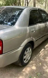 سواری مزدا323FL-AT نقره ای متالیک