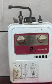 اب گرم کن  دیواری برقی ژاپنی اصل
