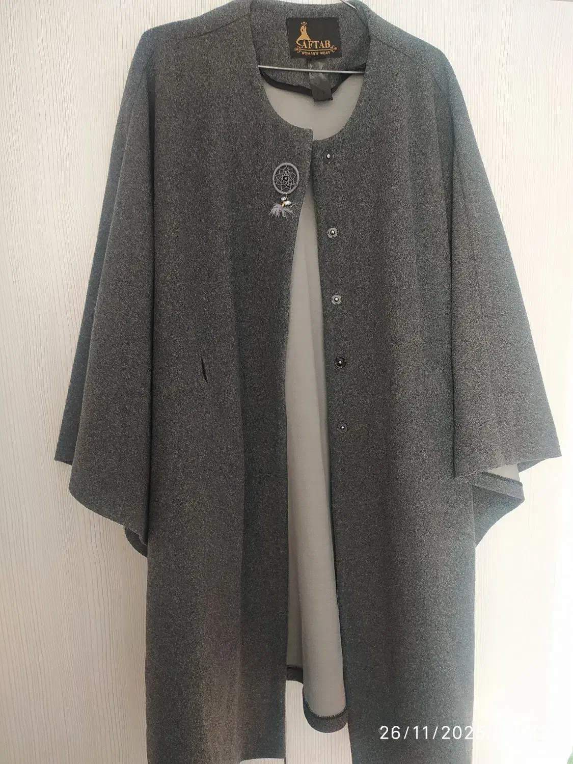 پالتو پانچو|لباس|هشتگرد, شهرک گلها|دیوار