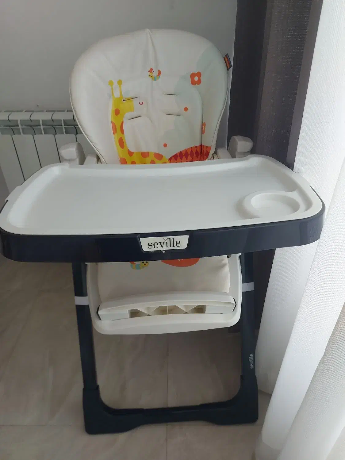 صندلی غذای کودک سویل اسپانیایی|تخت و صندلی بچه|رشت, رودباری|دیوار