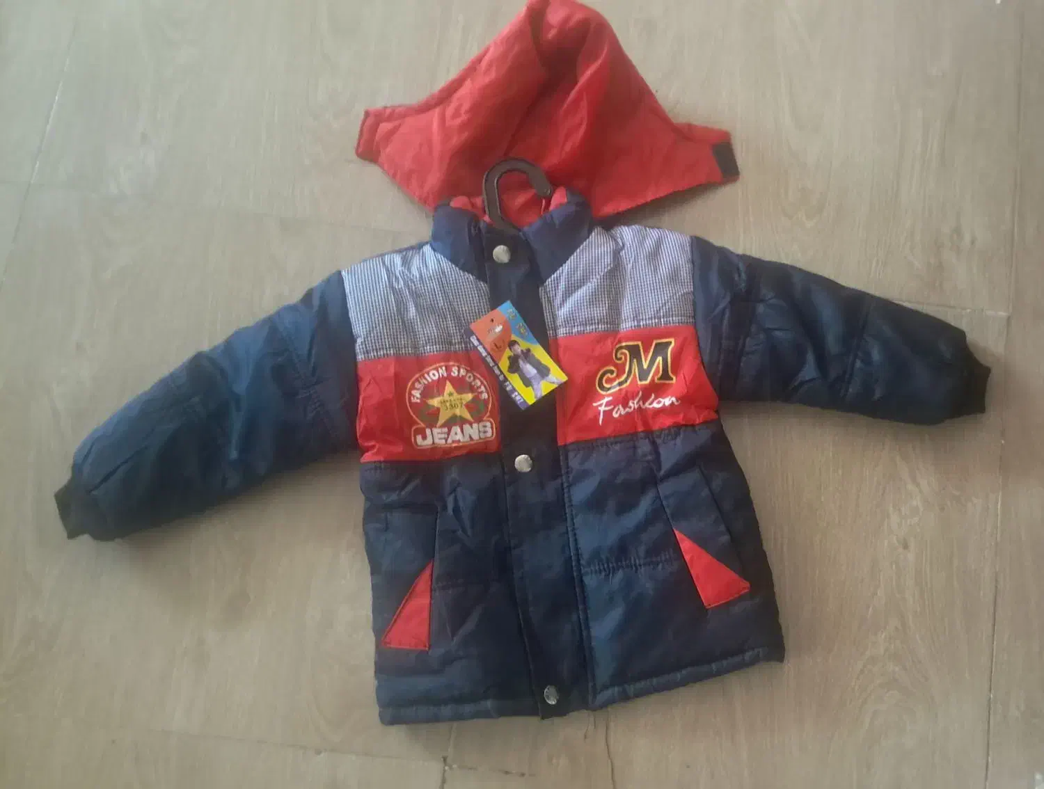 کاپشن|لباس|سرپل ذهاب, |دیوار