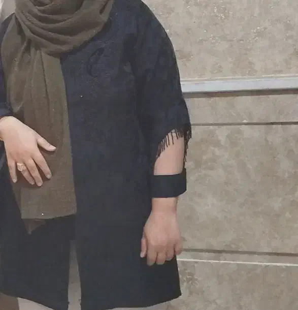 مانتومشکی|لباس|تربت جام, امام|دیوار