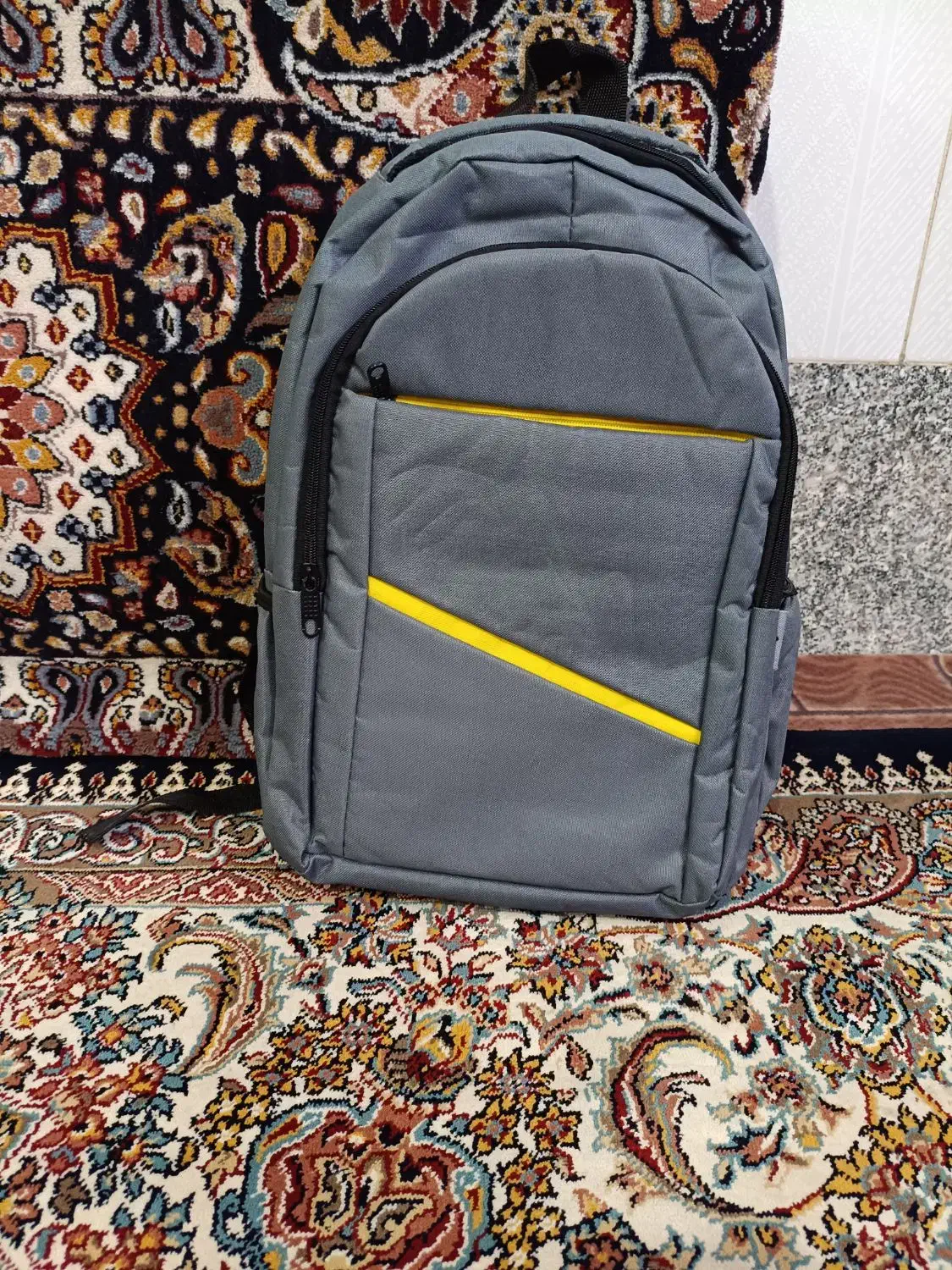 نونو|کیف، کفش، کمربند|قم, قلعه کامکار|دیوار